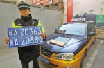 对比真假出租车：套牌车顶灯公司名称是手写(图) - 广西新闻网