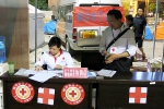 【我与红十字的故事】不惧危难，奋勇前行—中国红十字（广西）赈济救援队队员　谭周玉 - 红十字会