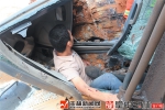 玉林：巨石崩塌压中挖掘机，一人被困驾驶室 - 广西新闻网